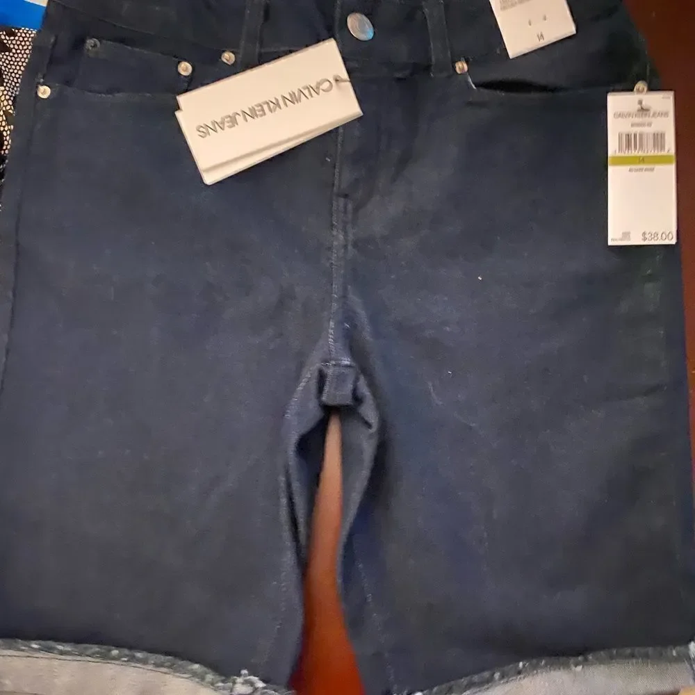 CALVIN KLEIN JEANS MID RISE SKINNY SHORTS